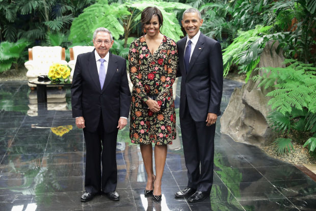 Cuban President Raul Castro with Michelle and Barack Obama before a state dinner at the Palace of the Revolution in Havana, Cuba.