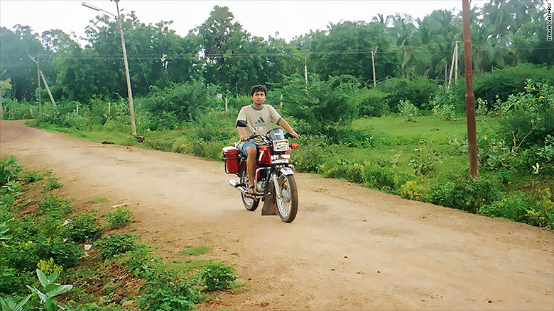 Kataru, as an undergraduate, on his way to college in India.