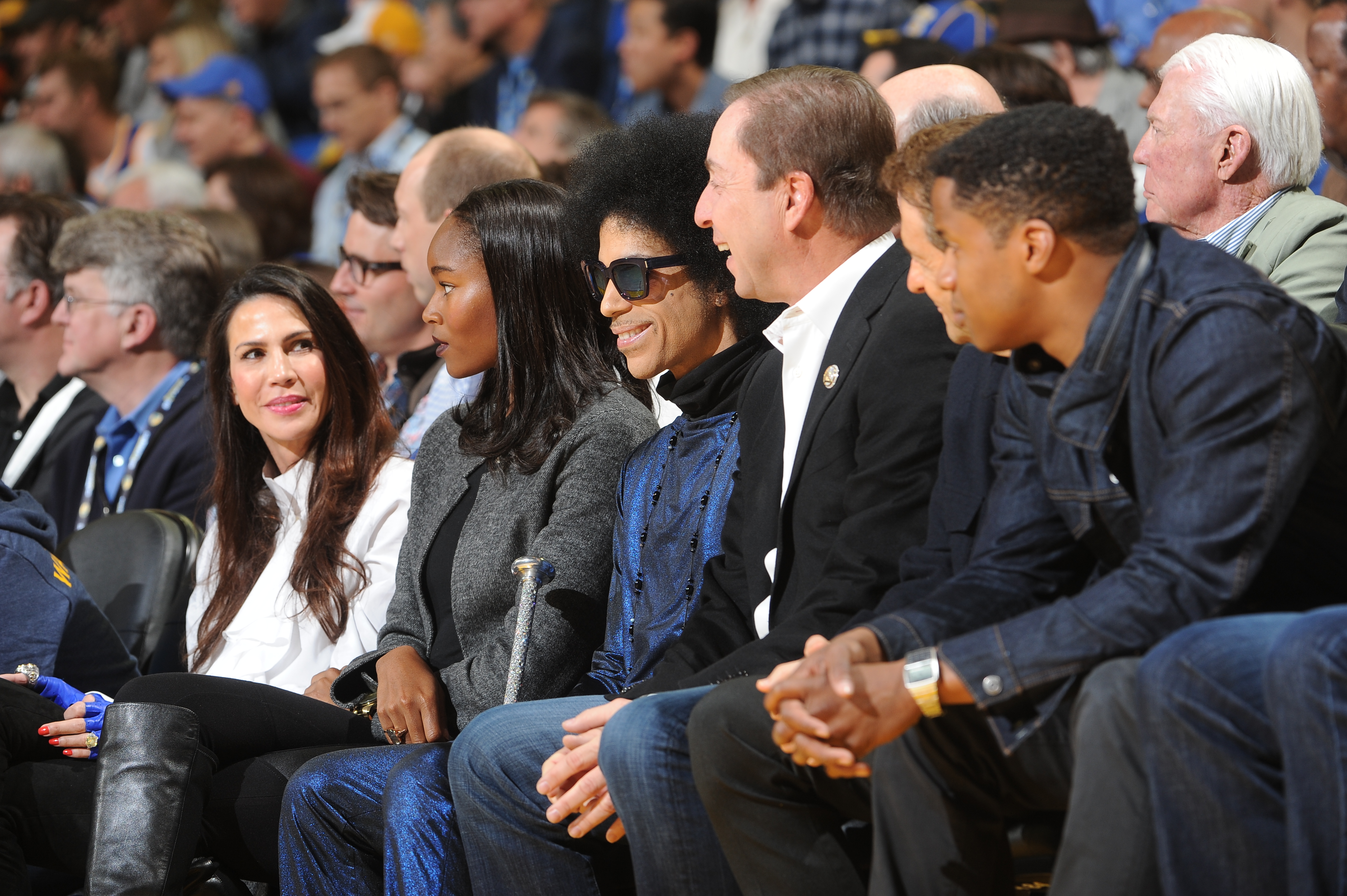 Prince takes in a game against the Oklahoma City Thunder next to Warriors owner Joe Lacob. (Photo courtesy GSW Media Services)