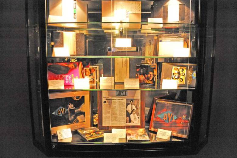 A case containing artifacts related to the success of Raju Sethi, founder and president of AVS TV. PHOTO BY HILDI BORKWOSKI