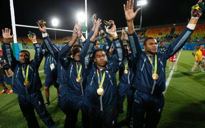 The Fijian team celebrate with their gold medals