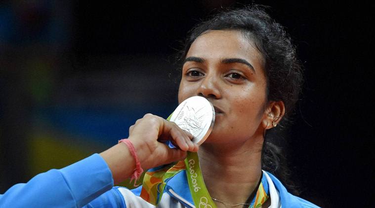 Rio de Janeiro: India's Pusarla V Sindhu kisses her silver medal after her match with Spain's Carolina Marin in women's Singles final at the 2016 Summer Olympics at Rio de Janeiro in Brazil on Friday. 