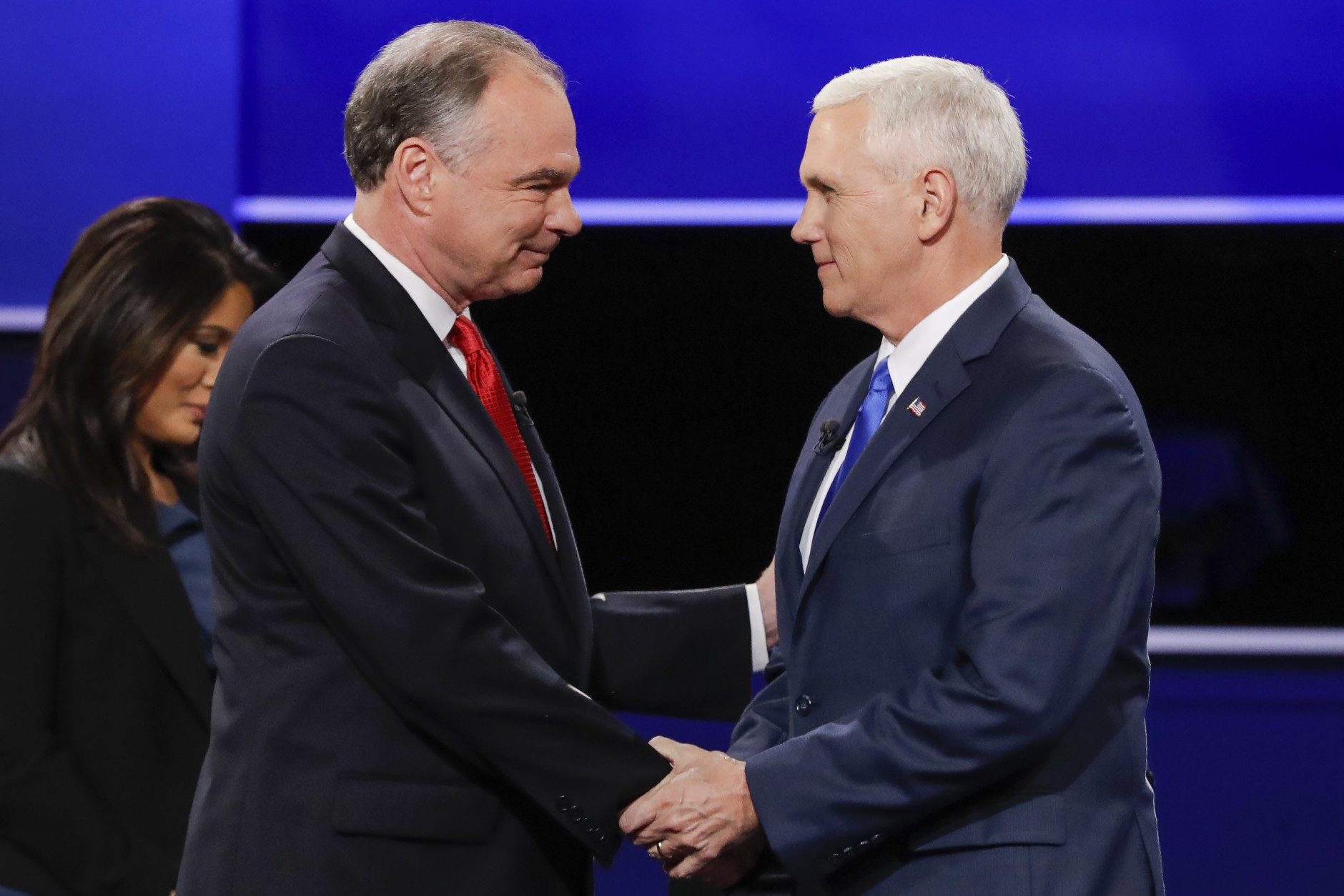 Republican vice-presidential nominee Gov. Mike Pence, right, and Democratic vice-presidential nominee Sen. Tim Kaine shake hands during the vice-presidential debate at Longwood University in Farmville, Va., Tuesday, Oct. 4, 2016. (AP Photo/David Goldman)
