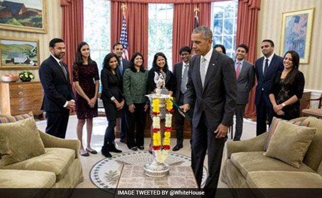President Barack Obama lit a Diya in the Oval Office to celebrate Diwali Sunday.