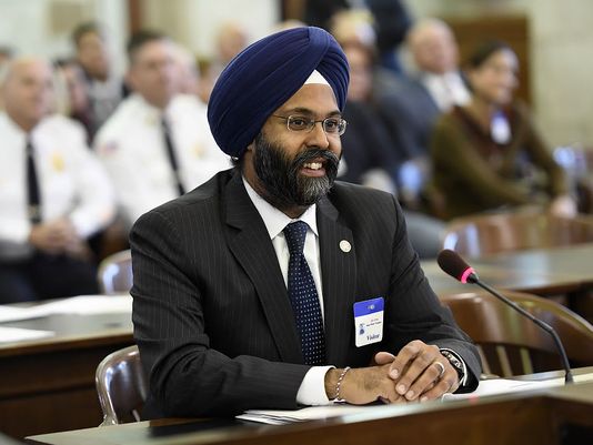 Gurbir S. Grewal smiles as senators within the State Senate Judiciary Committee voice their support to appoint Grewal to a full term after being the acting Bergen County Prosecutor since January on Thursday, Nov. 10, 2016.