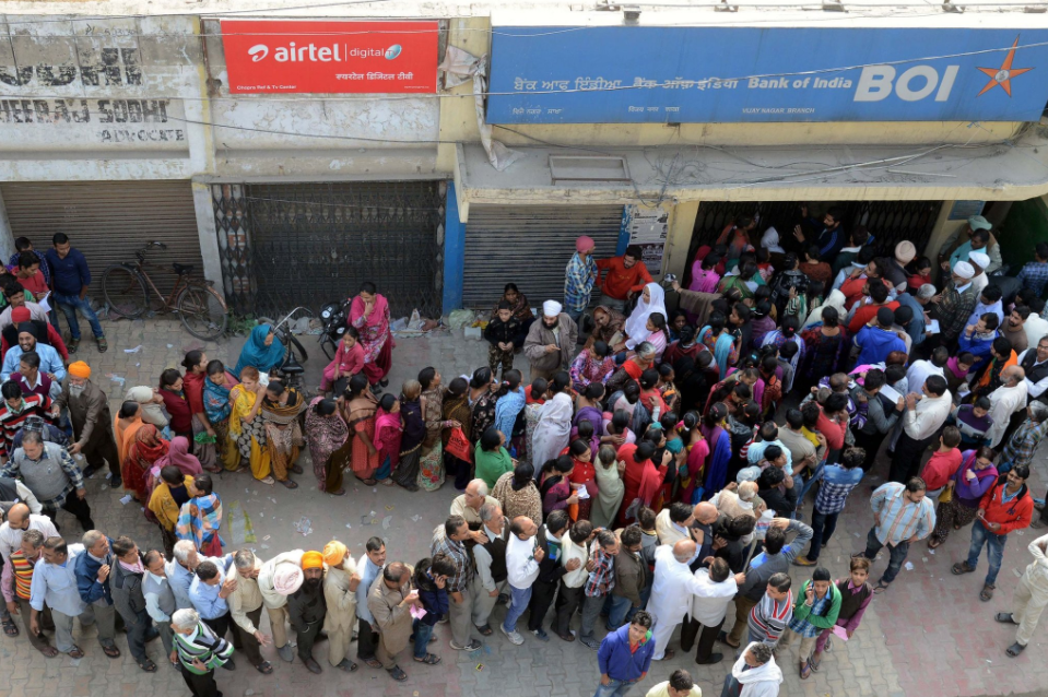 Waiting outside a bank in Amritsar, India, to exchange 500- and 1,000-rupee notes. Credit Narinder Nanu/Agence France-Presse — Getty Images