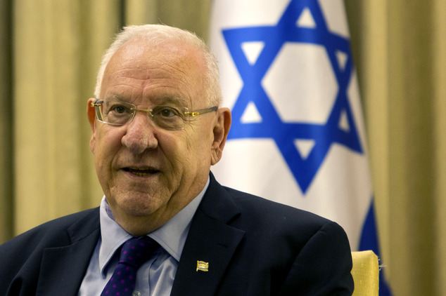 Israel's President Reuven Rivlin speaks during his meeting with New York Gov. Andrew Cuomo, at the President's residence in Jerusalem, Wednesday, Aug. 13, 2014. (AP Photo/Sebastian Scheiner)
