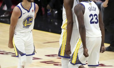 Golden State Warriors’ Kevin Durant celebrates with Stephen Curry, left, and Draymond Green (23) during the second half of Game 3 of basketball’s NBA Finals against the Cleveland Cavaliers, Wednesday, June 6, 2018, in Cleveland. The Warriors defeated the Cavaliers 110-102 to take a 3-0 lead in the series. (AP Photo/Carlos Osorio)