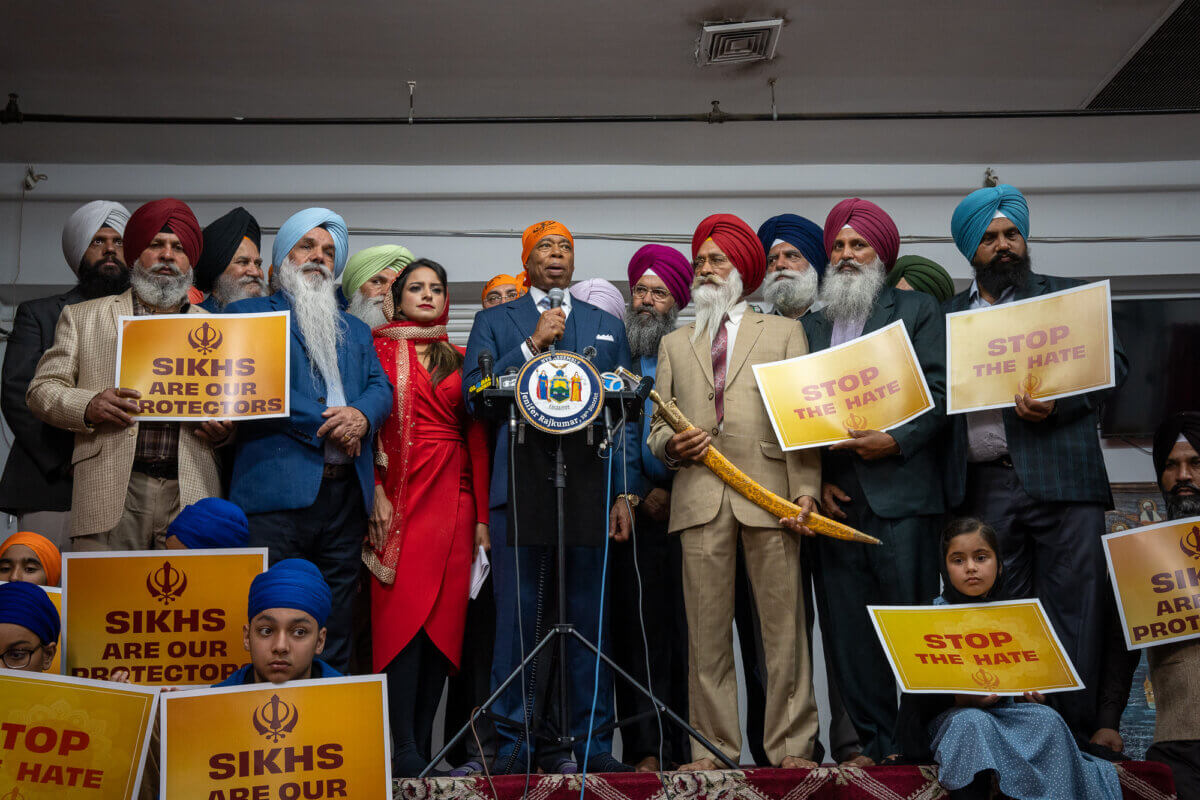 New York City Mayor Eric Adams, New York State Assemblymember Jenifer Rajkumar and Sikh community leaders