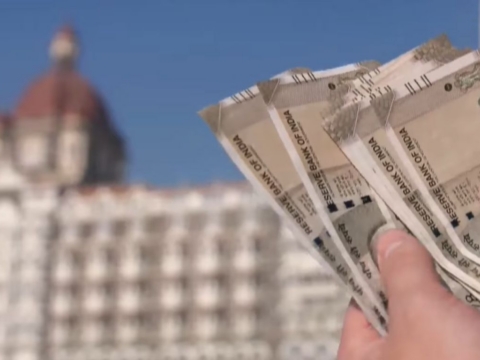 Indian rupee falls to record low vs. US dollar