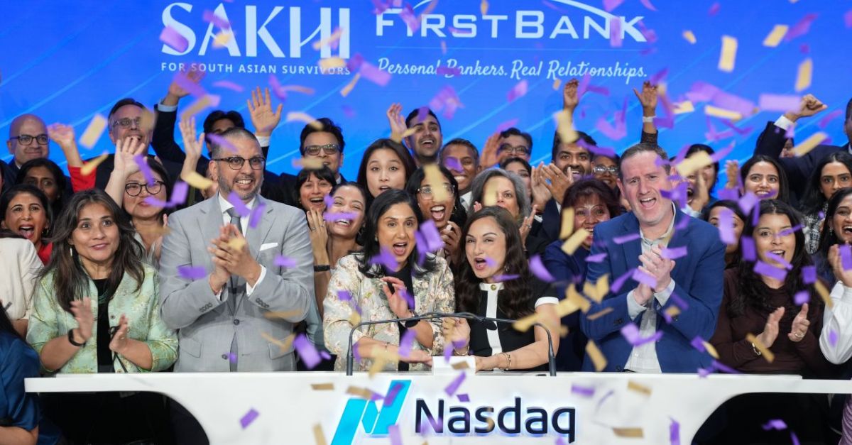 Sakhi for South Asian Survivors ring the Nasdaq’s closing bell